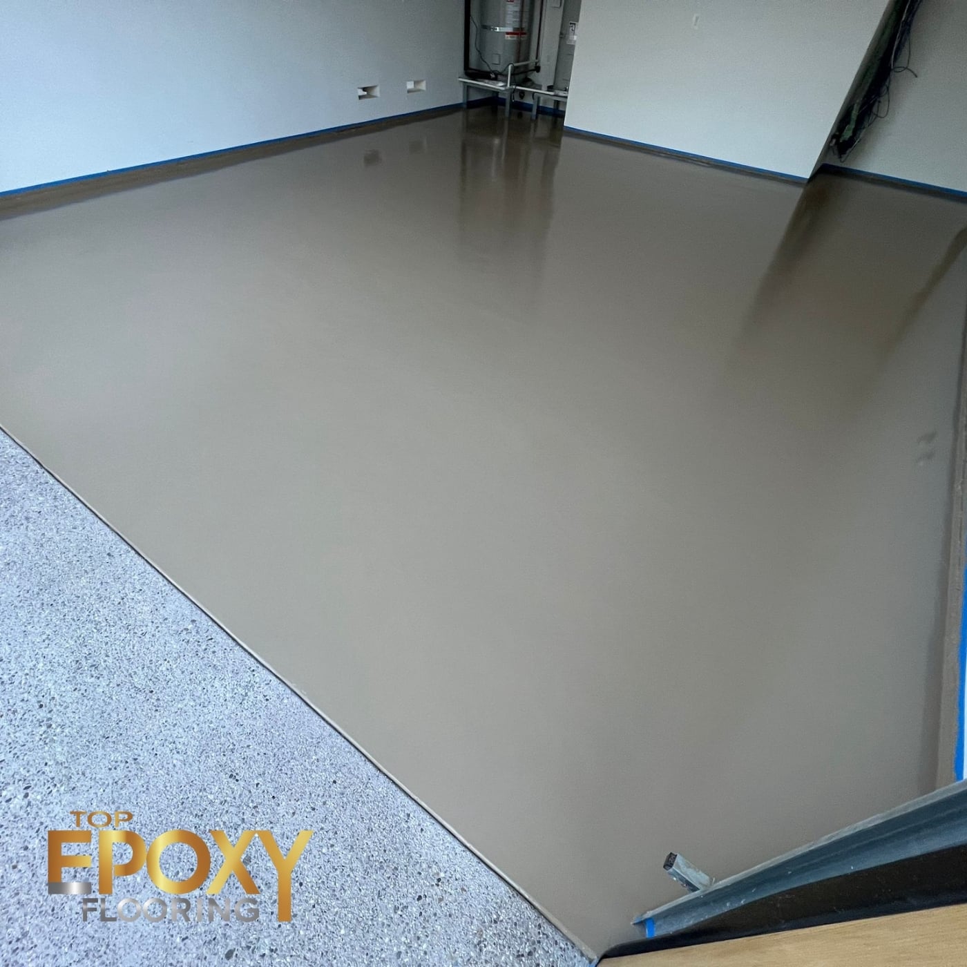 smooth brown epoxy floor in garage